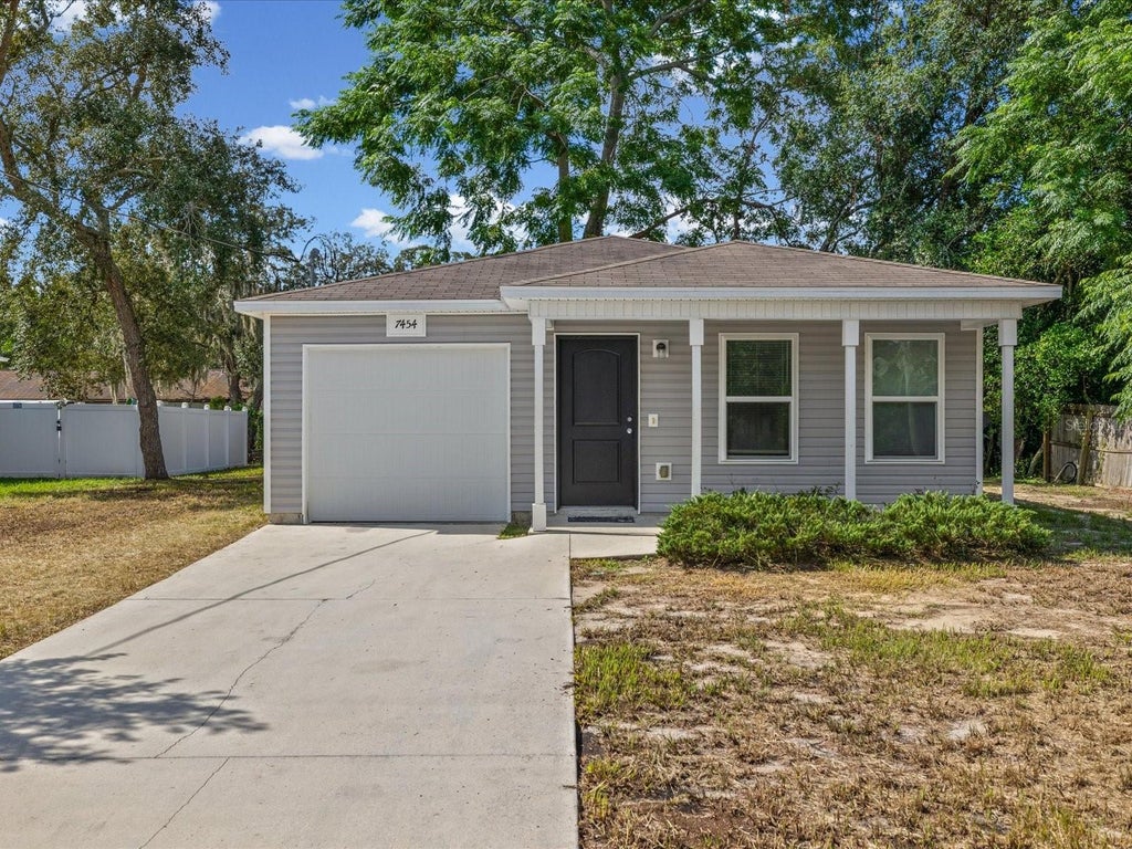 Photo of 7454 Mohawk Trail, Spring Hill, FL 34606 (MLS # W7888953)