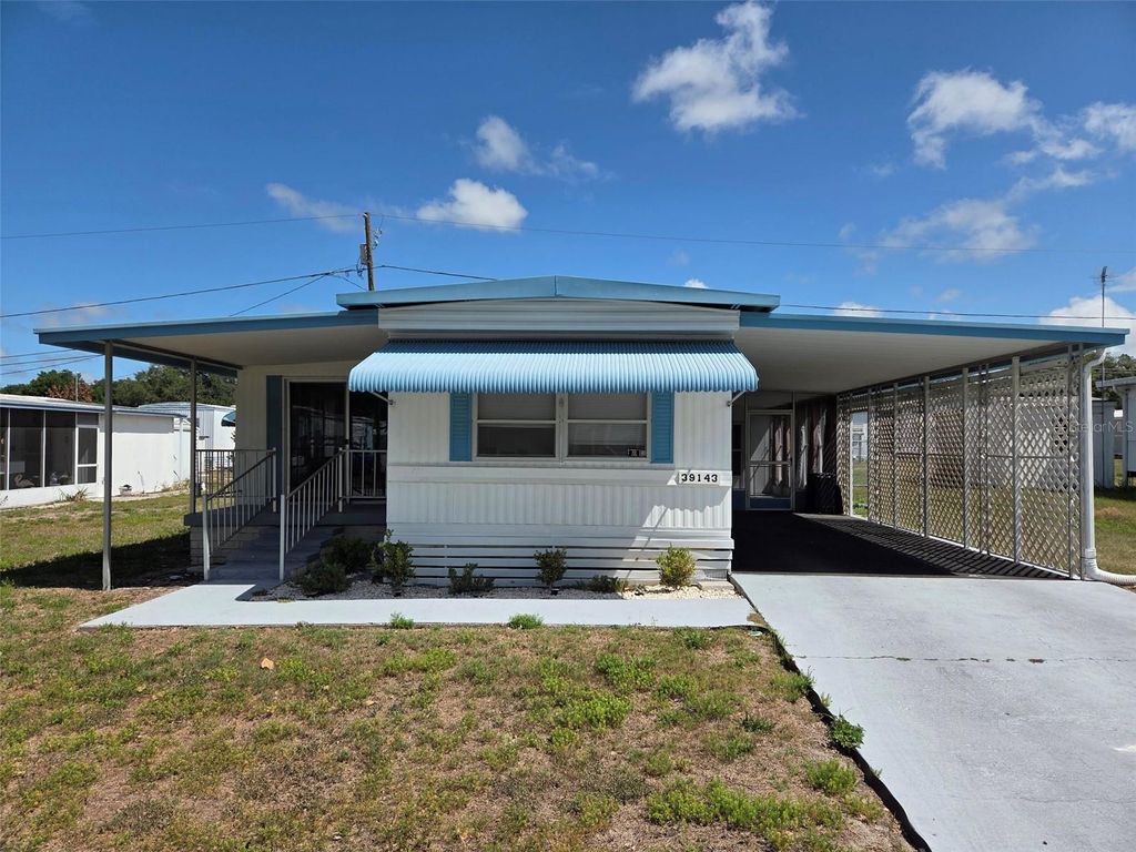 Photo of 39143 Ola Avenue, Zephyrhills, FL 33542 (MLS # TB8502624)