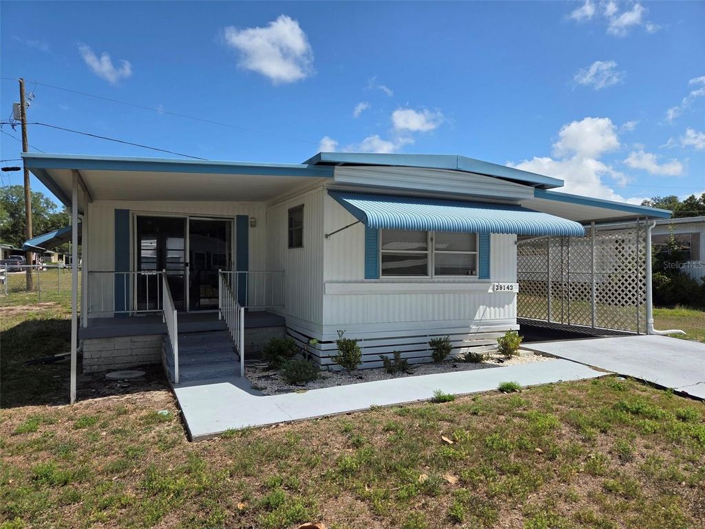 Photo of 39143 Ola Avenue, Zephyrhills, FL 33542 (MLS # TB8502624)