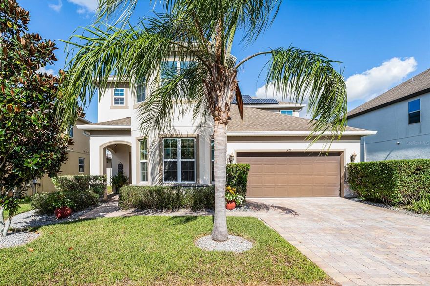 Step into luxury as you enter through the front door, greeted by a family room featuring a modern electric fireplace, offering both aesthetics and the option to emanate cozy warmth. The elegance continues with a 60-bottle wine fridge nestled in a built-in cabinet with a glass rack, setting the perfect tone for entertaining in style. Welcome home to a residence that effortlessly blends modern comfort with charm.  This exquisite 4-bedroom, 3.5-bath, 2-story residence boasts a private study with built-in shelves, offering serene pond views. Perfect for entertainers, revel in the 7-seat theater room with surround sound upstairs among the 3 bedrooms and 2 full baths. 
The spacious kitchen and island are a culinary haven, while the dining room's electric stone fireplace and ceiling-to-floor storage cabinets create a cozy and functional focal point. Across from the kitchen you will find the primary bedroom that boast an oversized custom closet and a large built in shelving and storage space equipped with an electric fireplace. 

Indulge in the ultimate outdoor oasis with a paver patio featuring a pebble tech surface pool that becomes a work of art with the LED Lights and captivating water features.  The stone bar and and grill is a haven for entertainment, and the LED bar lighting creates a vibrant atmosphere. Complete with a fridge and microwave for convenience, this outdoor retreat is designed for the perfect ambiance for those memorable evenings. Live in a home where every detail is designed for your relaxation and enjoyment. Outback you will find a wood burning fire pit under a pergola with gorgeous bougainvillea vines and hammock for a afternoon nap retreat. 
This home is for YOU, the Entertainer!