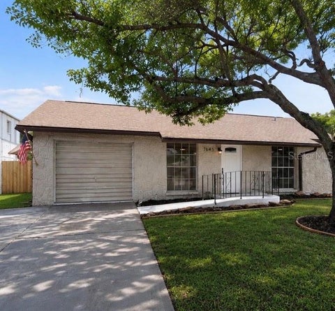 Photo of 7645 Arlight Drive, New Port Richey, FL 34655 (MLS # TB8537147)