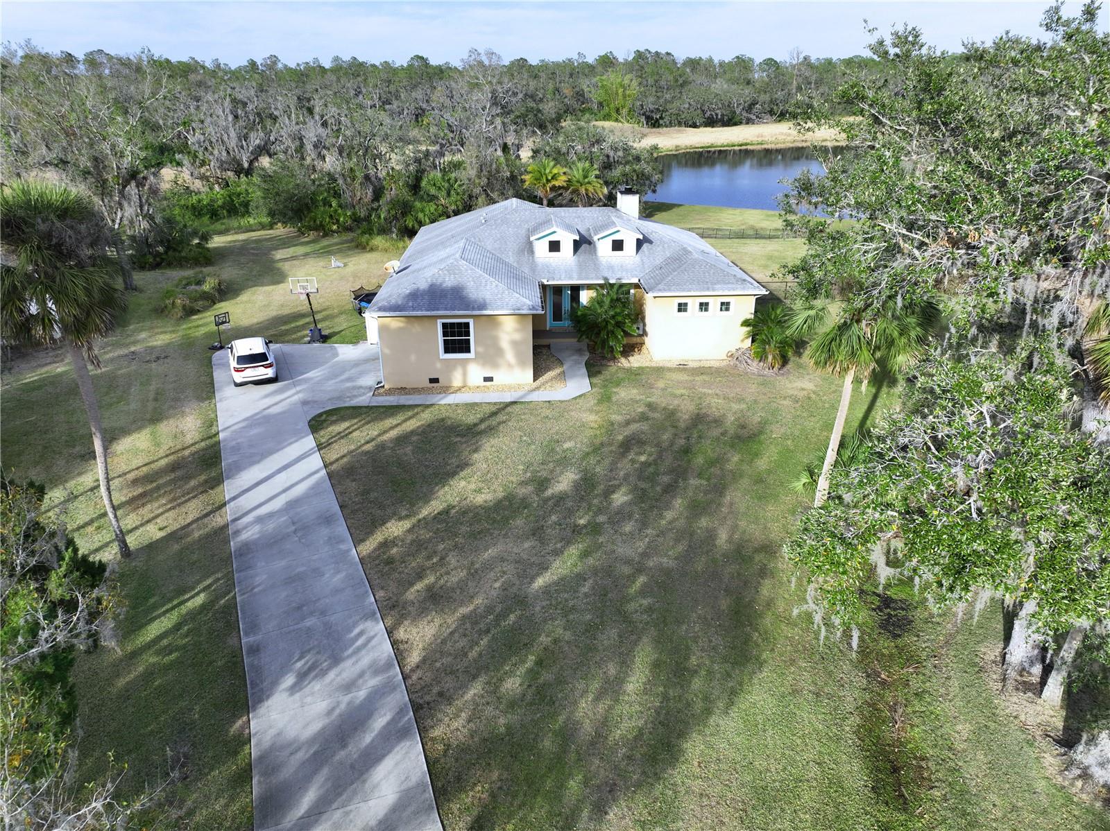 2017-Built Lakefront Home in Oak Ford – Rare Find with Tons of Space!
If you’ve been searching for a newer home in the highly desirable Oak Ford community, this is it! Built in 2017—a rare find in a neighborhood of mostly 1990s homes—this 4-bedroom, 2.5-bath home with a bonus room sits on a massive 33,917-square-foot lot with stunning lakefront views. And yes, there’s plenty of room to add a pool!
Step inside to an airy, light-filled space with multiple skylights and an open layout that makes everyday living easy. The kitchen has a huge island, perfect for meal prep or gathering with friends and family. The primary suite is a dream, featuring a Roman bathtub, double vanity, and an oversized double shower with two showerheads—because why settle for just one?
Tucked away on a private cul-de-sac surrounded by gorgeous estate homes, this property offers peace and privacy while still being just a short drive from Sarasota’s best dining, shopping, and world-famous beaches.
Homes like this don’t come up often in Oak Ford—schedule your showing today before it’s gone!