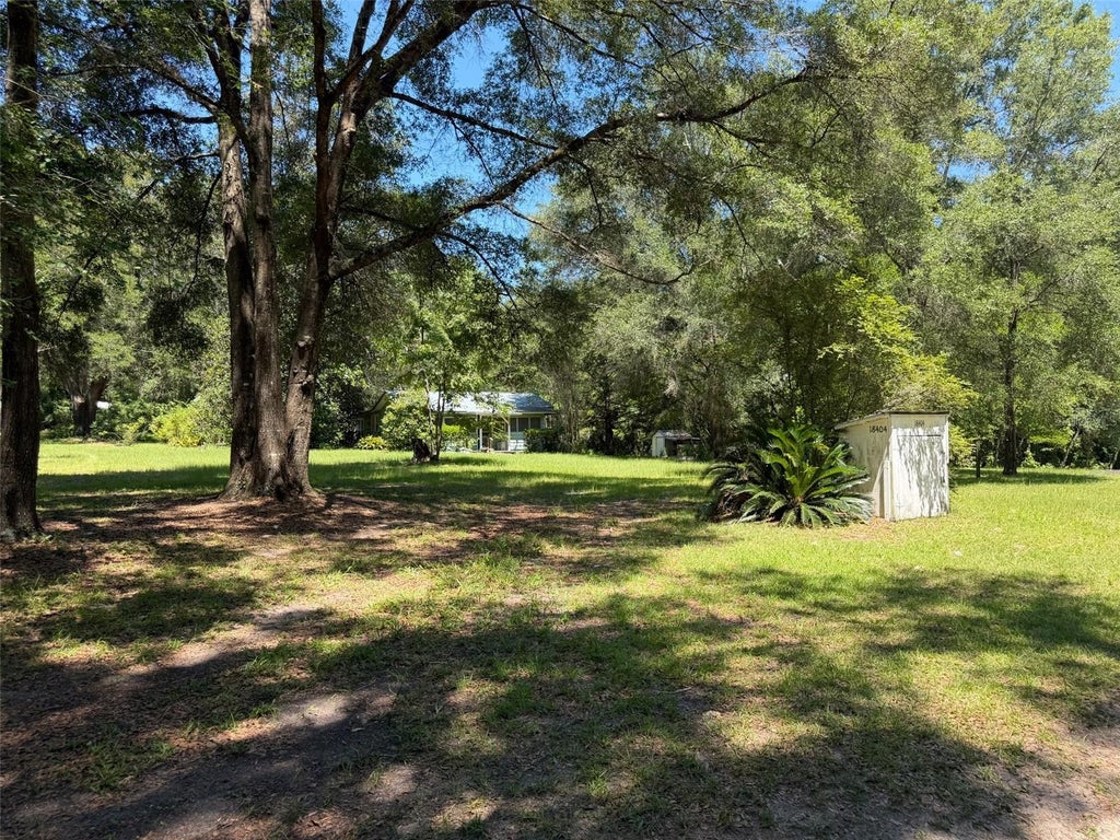 Photo of 18404 NW 272nd Terrace, High Springs, FL 32643 (MLS # GC541454)