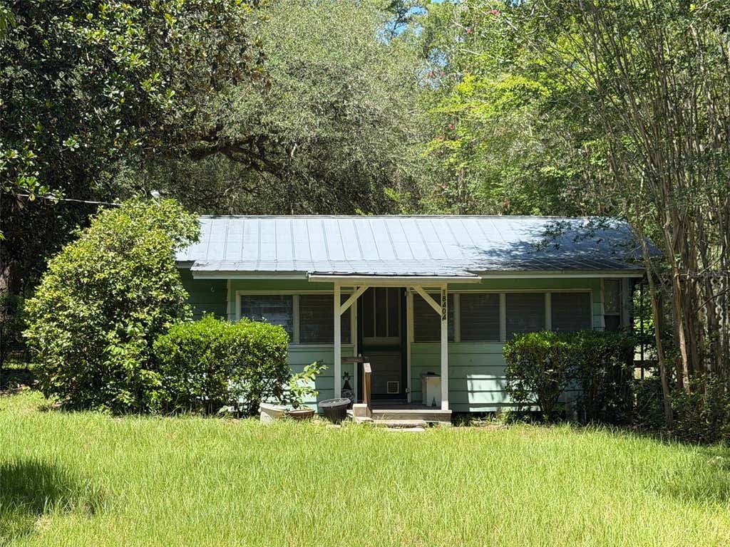 Photo of 18404 NW 272nd Terrace, High Springs, FL 32643 (MLS # GC541454)