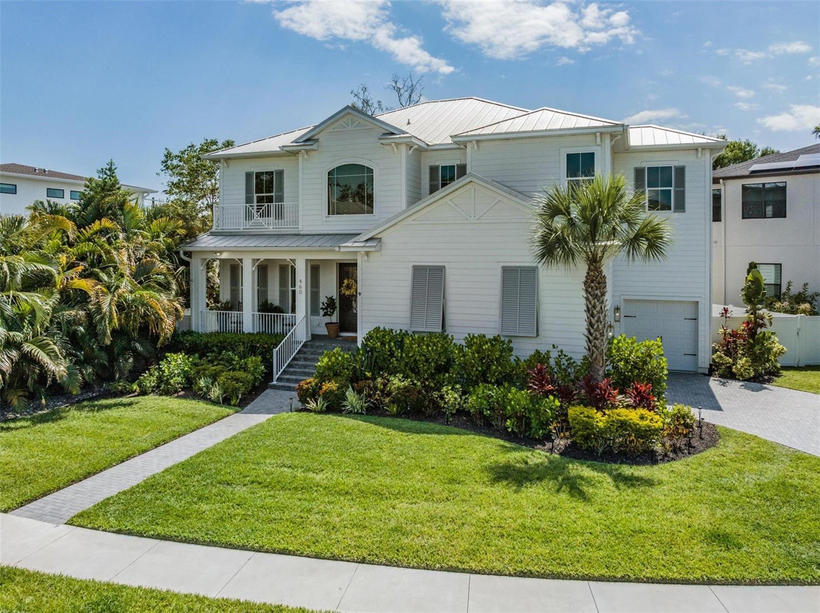 Delight in the coastal charm of this elegant 5-bedroom, 4-bathroom gem nestled in the heart of the renowned Davis Islands. Built in 2018, this property's aesthetic combines the essence of coastal-inspired design with contemporary comforts, offering an enchanting retreat just a stone's throw away from the vibrant city life.
As you approach this stunning residence, the first thing that will catch your attention is its striking metal roof – a nod to the property's coastal design influences. Upon entering, you are greeted by a spacious open-concept floor plan that seamlessly merges the living, dining, and kitchen spaces – perfect for both quiet family nights and entertaining guests.
The gourmet kitchen is a cook's dream with state-of-the-art appliances and plenty of counter space. Enjoy family meals in the dining area, or step out onto the spacious screened-in patio for al fresco dining in the Florida evenings.
The property boasts five luxuriously appointed bedrooms, each offering a tranquil retreat from the world. The four beautifully designed bathrooms, complete with modern finishes, ensure no one ever has to compete for space in the mornings.
The home office/study provides a serene environment for work or contemplation, where you can take advantage of the natural light flooding through the large windows.
Stepping outside, the property continues to impress with its resort-style pool area. Take a dip in the shimmering heated/salt pool, lounge on the sun-drenched deck, or take refuge in the shade of the patio - it's like having a private oasis in your backyard.
Experience the unique blend of city living and coastal tranquillity in this splendid Davis Islands home. With its premium location, stylish design, and high-end features, this property offers an unparalleled lifestyle for the discerning buyer.
Don't miss this opportunity to own a piece of paradise in one of Tampa's most sought-after locations. Schedule a viewing today to fully appreciate everything this remarkable home has to offer.
