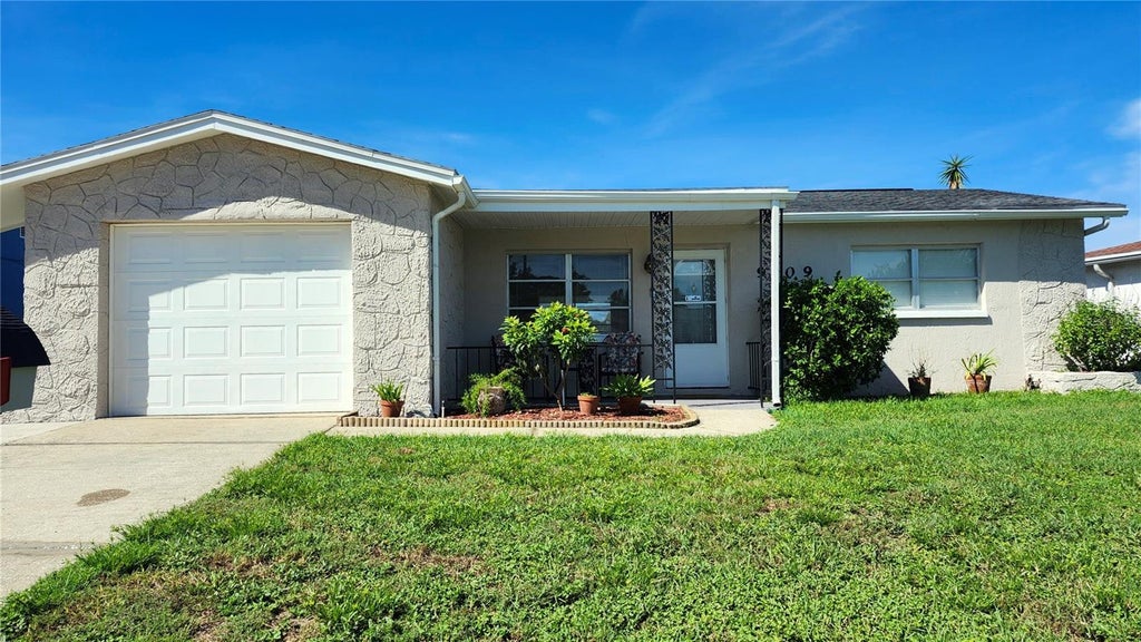 Photo of 9709 Lakeside Lane, Port Richey, FL 34668 (MLS # TB8540658)