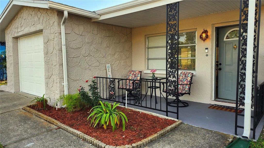Photo of 9709 Lakeside Lane, Port Richey, FL 34668 (MLS # TB8540658)