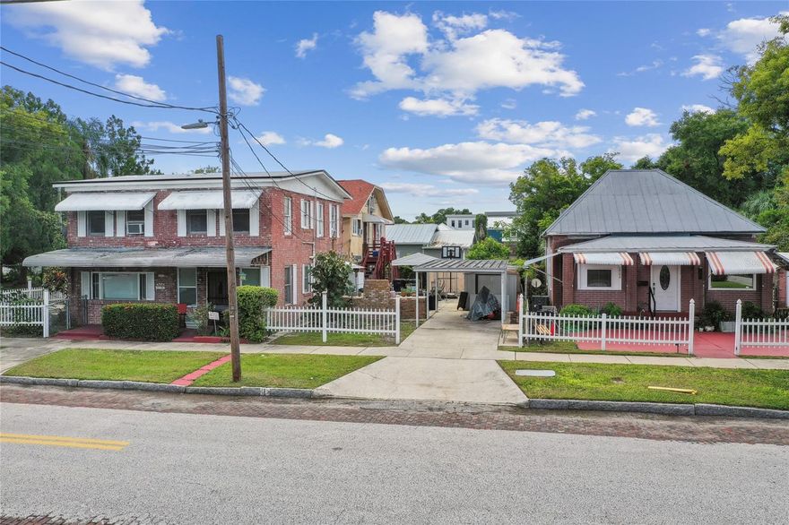 OPPORTUNITY ZONE: There are a total of 8 rental units in 4 buildings: 1 Single family-4 bedroom/2 bath, 2nd Single Family-2 bedroom/2 bath, 1 Apartment Building with 4 studio units plus TWO- 1 bedroom/1 bath units. Built in 1935, 1940, and 1946, these buildings reflect a rich history from a time when Tampa Heights blossomed into a vibrant community characterized by residential and commercial growth. Each unit and both homes are separately metered and tenants pay all utilities except water/sewer and small gas bill. This lot is 10,922 sq ft and is zoned RM-24. If redeveloped, it is approved for 6 new units. Seller will consider financing with substantial down payment. 
This property has been treasured by the same family since 1960, serving as a beacon of hope and renewal for many. The owner has offered below-market rental rates, as a service in the community for the past 15 years. With some renovations, these stately residences have the potential to significantly increase the rental income.The property has great access on a corner and with an alley running along the north side. Conveniently located just a few blocks from Highland Park, the YMCA, Armature Works, and the scenic Tampa Riverfront Waterworks park, this property is also near Perry Harvey Sr. Park’s skatepark, a variety of shopping options, entertainment hubs, fine dining, as well as cultural and artistic venues. With easy access to Downtown Tampa, Ybor City, and Tampa International Airport, the location is ideal for both residents and investors. 
The property's size and location present a unique development opportunity in one of Tampa Bay's fastest-growing neighborhoods. As the area's progress continues, opportunities like this are becoming increasingly rare. Seller will consider financing with favorable terms.
Please respect the privacy of the current tenants—do not trespass or engage with them. Showings are available by appointment only with 48-72 hours' notice.