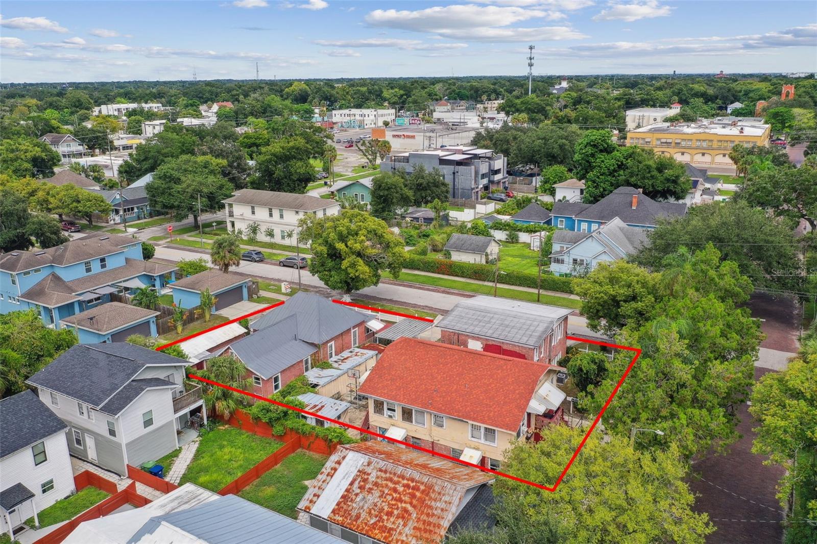 Great opportunity to purchase part of Tampa Height's History. There are a total of 8 rental units in 4 buildings: 1 Single family-4 bedroom/2 bath, 2nd Single Family-2 bedroom/2 bath, 1 Apartment Building with 4 studio units plus TWO- 1 bedroom/1 bath units. Built in 1935, 1940, and 1946, these buildings reflect a rich history from a time when Tampa Heights blossomed into a vibrant community characterized by residential and commercial growth. Each unit and both homes are separately metered and tenants pay all utilities except water/sewer and small gas bill. This lot is 10,922 sq ft and is zoned RM-24. If redeveloped, it is approved for 6 new units.
This property has been treasured by the same family since 1960, serving as a beacon of hope and renewal for many. The owner has offered below-market rental rates, as a service in the community for the past 15 years. With some renovations, these stately residences have the potential to significantly increase the rental income.The property has great access on a corner and with an alley running along the north side. Conveniently located just a few blocks from Highland Park, the YMCA, Armature Works, and the scenic Tampa Riverfront Waterworks park, this property is also near Perry Harvey Sr. Park’s skatepark, a variety of shopping options, entertainment hubs, fine dining, as well as cultural and artistic venues. With easy access to Downtown Tampa, Ybor City, and Tampa International Airport, the location is ideal for both residents and investors.
The property's size and location present a unique development opportunity in one of Tampa Bay's fastest-growing neighborhoods. As the area's progress continues, opportunities like this are becoming increasingly rare.
Please respect the privacy of the current tenants—do not trespass or engage with them. Showings are available by appointment only with 48-72 hours' notice.