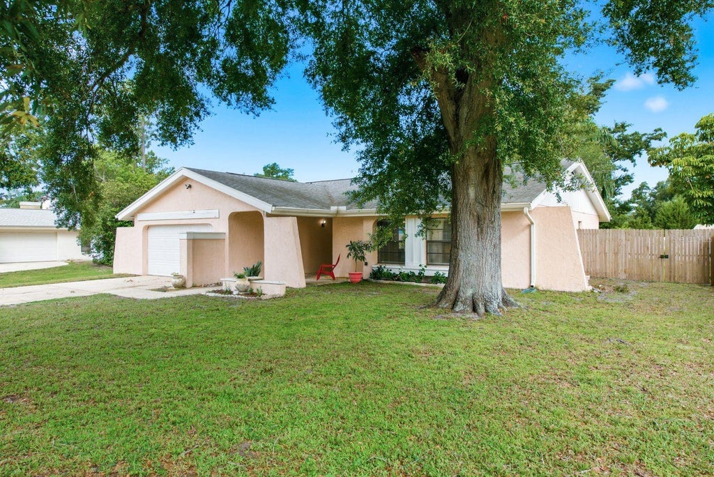 Photo of 3916 Lake St George Drive, Palm Harbor, FL 34684 (MLS # TB8526845)