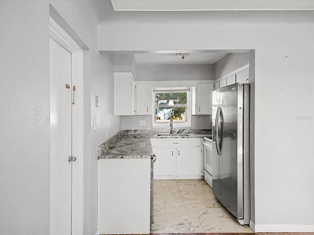 Photo of 9828 49th Avenue N, St Petersburg, FL 33708 (MLS # TB8467252)