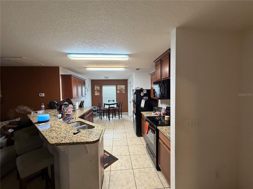 Photo of 487 Ocho Rios Avenue, Tavares, FL 32778 (MLS # TB8487209)