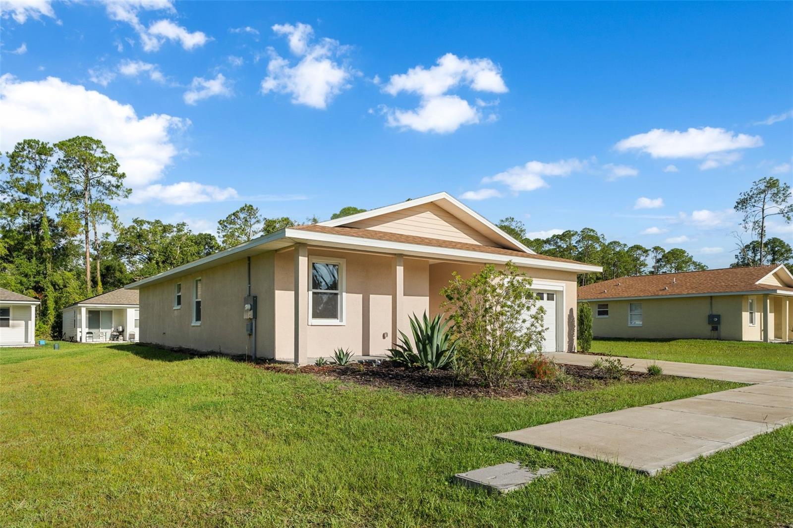 Beautiful 3/2 with a 1 car garage. Built in 2022, this home has LVP flooring in the main areas, carpet in the bedrooms and tile in the bathrooms. Granite counter tops and stainless steel appliances. Conveniently located in NE Gainesville, shopping, entertainment, UF and Shands are all nearby!