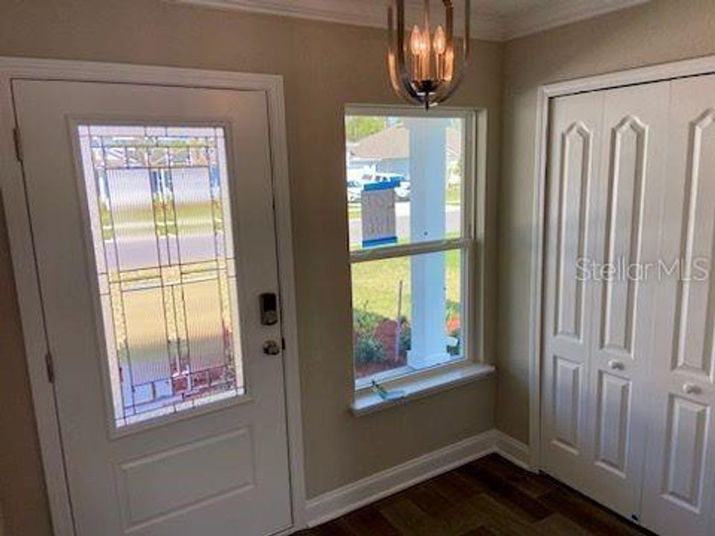 Photo of 27 Lumber Jack Trail, Palm Coast, FL 32137 (MLS # FC298260)