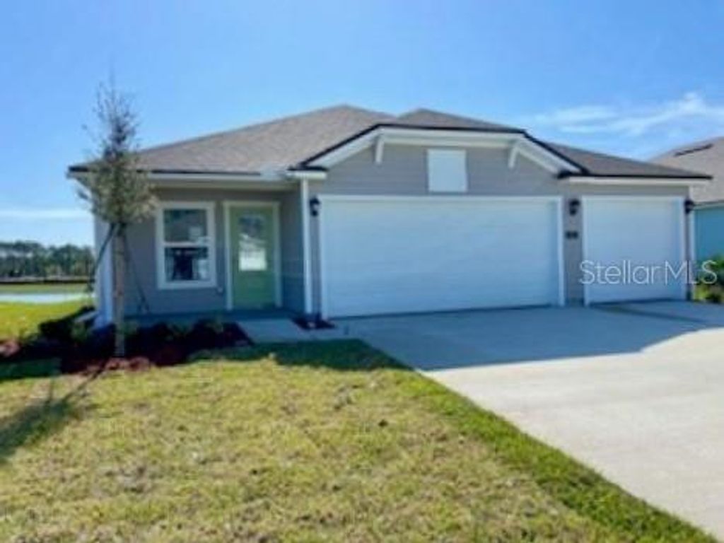 Photo of 27 Lumber Jack Trail, Palm Coast, FL 32137 (MLS # FC298260)
