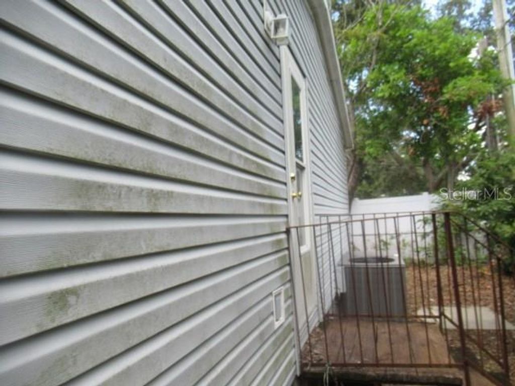 Photo of 330 Archimedes Street, Dunedin, FL 34698 (MLS # TB8434130)