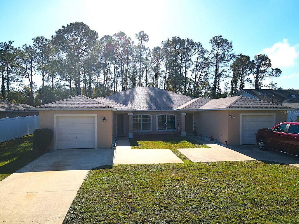 Photo of 20 Plateau Lane #A, Palm Coast, FL 32164 (MLS # FC314755)