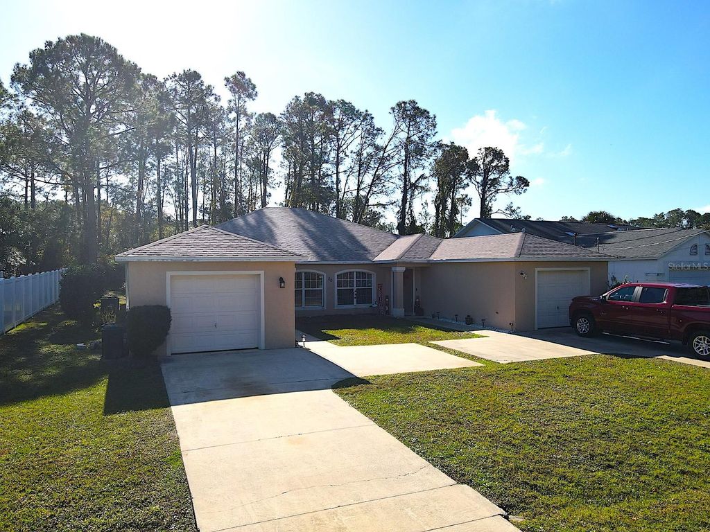 Photo of 20 Plateau Lane #A, Palm Coast, FL 32164 (MLS # FC314755)
