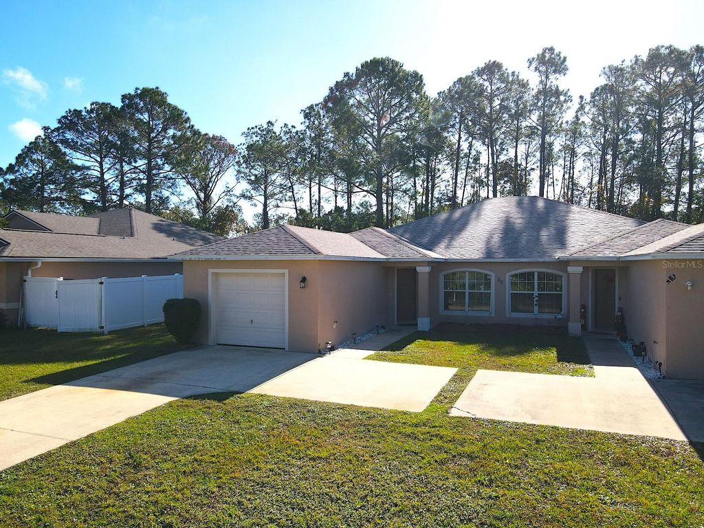 Photo of 20 Plateau Lane #A, Palm Coast, FL 32164 (MLS # FC314755)