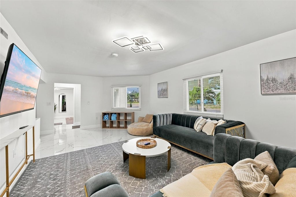Photo of 14019 W Parsley Drive, Madeira Beach, FL 33708 (MLS # TB8560574)