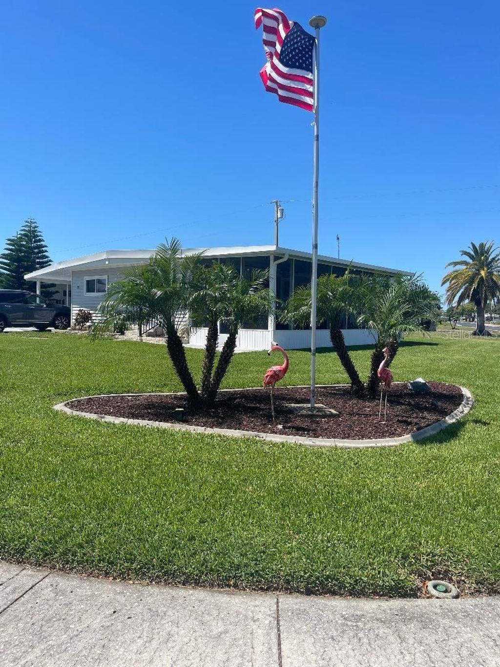 Photo of 57 Harbor Way #24, Palm Harbor, FL 34684 (MLS # TB8374884)