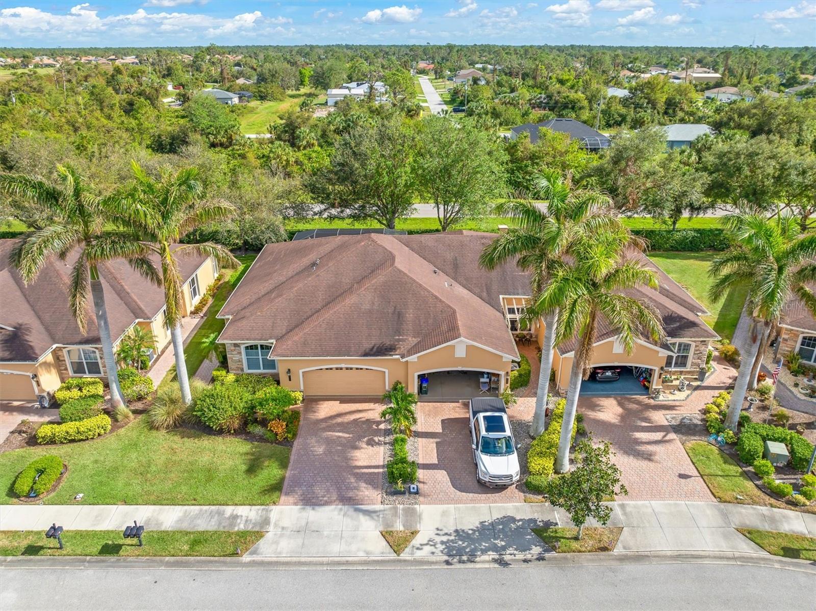 One or more photo(s) has been virtually staged. Short Sale. Live the resort lifestyle every day in this rare North Port villa—one of the only homes in Turnberry Trace with its own private heated saltwater pool.
Set in a gated community with low HOA fees, this 3-bedroom home offers modern upgrades, elegant finishes, and stress-free Florida living.
Why vacation anywhere else? Your private pool paradise in our exclusive gated community is all you need! Welcome to 4410 Turnberry Circle in the gated Villas of Turnberry Trace! This charming three-bedroom, two-bathroom home with a two-car garage blends classic elegance with modern convenience.
Arrive to a well-maintained paver driveway, lush landscaping, and welcoming brick accents. Inside, vaulted ceilings, large windows, and ceramic tile flooring enhance the open living and dining areas with light and elegance. The kitchen shines with honey-toned cabinets, granite countertops, stainless steel appliances, and a central island—perfect for cooking and entertaining.
The primary suite offers a serene escape with a spacious layout, an en-suite bathroom featuring double sinks and a Roman shower, plus lanai access. Two additional bedrooms provide versatility for guests or a home office.
Step outside to your private screened lanai featuring a heated saltwater pool—one of just a few homes in the entire community with its own private pool—ideal for relaxing or hosting gatherings.
This home is ready for worry-free living with freshly cleaned vents, mold/mildew treatment, a new pool pump, salt cell, and surge protector. The kitchen shines with a new sink, faucet, and garbage disposal, while updated garage door equipment adds convenience.
Extras include hurricane shutters, a storage-ready two-car garage, and a new A/C installed in 2021. With low HOA fees, enjoy access to a clubhouse and more. Conveniently located near highways, shopping, dining, golf, and beaches, this home offers an active yet relaxed lifestyle.
Don't miss your chance—schedule a private tour today!