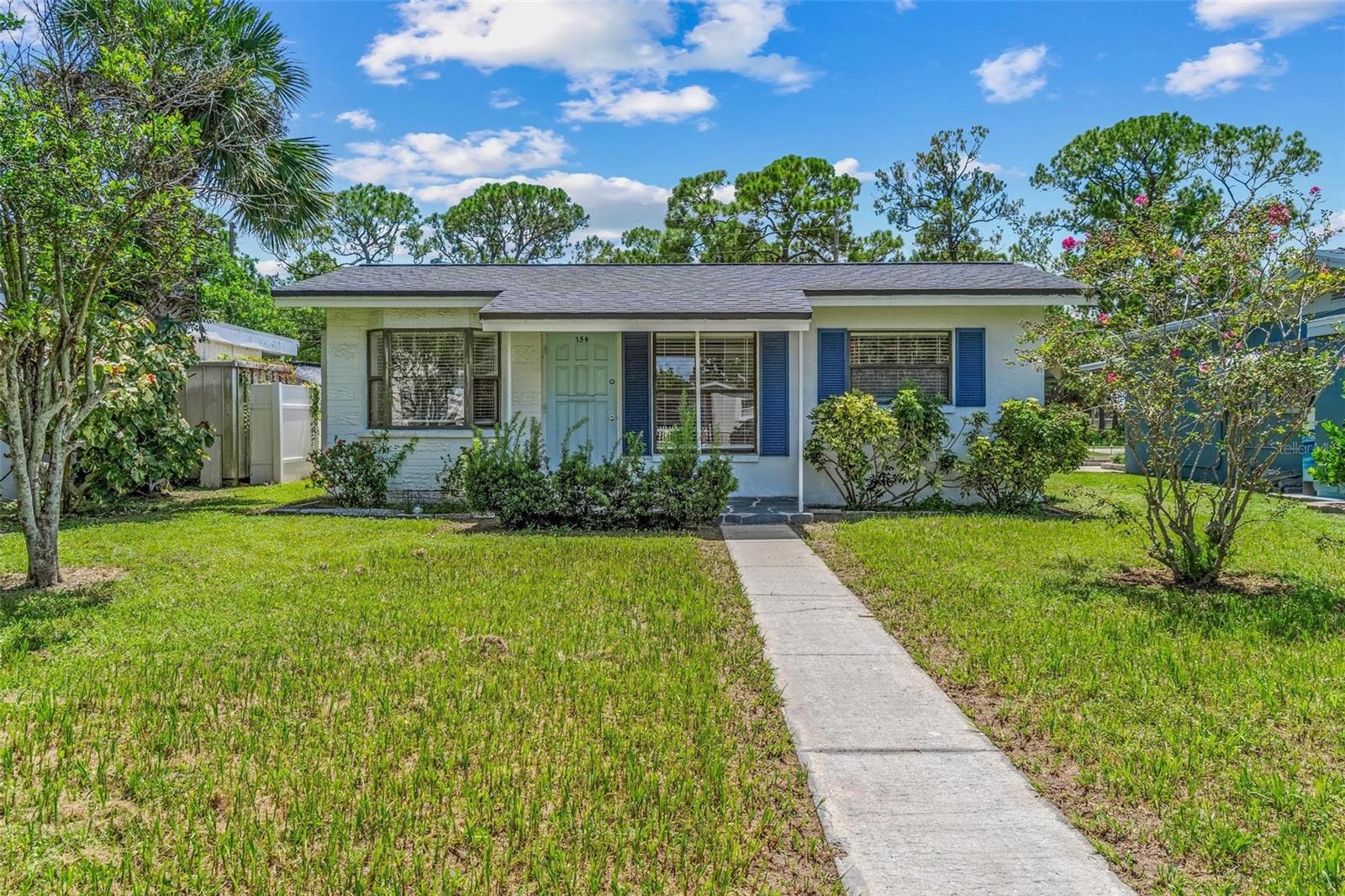 Welcome to this charming 3-bedroom, 1-bath home in a prime St. Petersburg location—backing directly onto Fossil Park with private access right from your backyard. Imagine walking out your door and onto scenic nature trails, playgrounds, sports courts, and the Willis S. Johns Recreation Center, which offers year-round activities including tennis, pickleball, basketball, baseball, skateboarding, and two incredible pools.
Inside, you’ll find a comfortable layout with a mix of terrazzo, ceramic tile, and laminate flooring. The open living area features vaulted ceilings for a bright and spacious feel, while the kitchen is designed for efficiency with a practical triangle workspace. The bathroom has been updated with a modern walk-in shower, and additional storage is plentiful thanks to a large laundry area and bonus storage room off the carport.
This home remained safe and dry through the 2024 hurricane season, offering peace of mind to its next owner. Whether you’re looking for a primary residence or an investment opportunity, this property delivers a unique blend of comfort, functionality, and unbeatable location. With direct access to Fossil Park, nearby schools, shopping, and just minutes from Downtown St. Pete and the beaches, this home is truly a rare find. Schedule your private showing today!