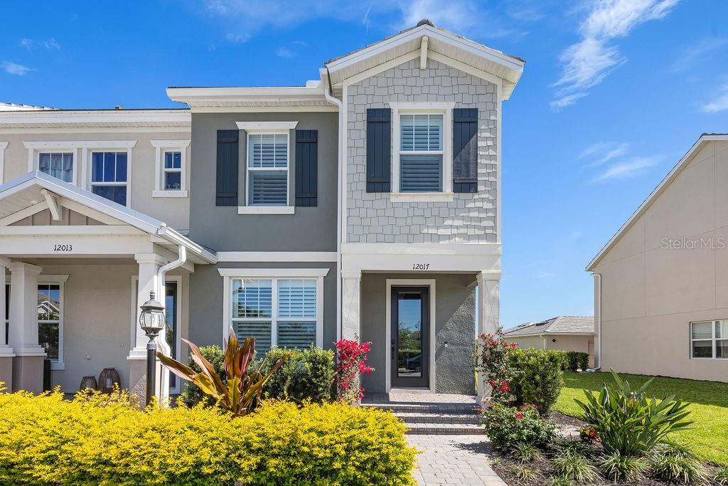 Welcome to this luxurious three-story townhouse nestled in the prestigious Mallory Park community in Lakewood Ranch, Florida. As you step
inside this beautifully designed home, you're greeted by an ambiance of sophistication and elegance. This home boasts a charming exterior
façade with impeccable landscaping, including lush greenery and colorful plants. Upon entering the foyer, you're welcomed into a spacious living area featuring high ceilings and large windows, allowing abundant natural light to flood the space. The open-concept layout seamlessly connects the living room to the dining area and kitchen, creating an ideal space for gatherings and entertaining guests. The gourmet kitchen is a chef's dream, equipped with top-of-the-line stainless steel appliances, custom cabinetry, quartz countertops, and a center island with bar seating. Adjacent to the kitchen, a cozy breakfast nook overlooks the courtyard, providing the perfect spot for enjoying your morning coffee. Ascending to the second floor, you'll find the luxurious primary suite, a tranquil retreat designed for relaxation. The primary bedroom features plush carpeting, a spacious walk-in closet, and large windows offering picturesque views of the surrounding landscape. The ensuite bathroom boasts a spa-like atmosphere with dual vanities and a separate walk-in shower. Two additional bedrooms on this floor provide comfortable
accommodations for family members or guests, each with ample closet space and easy access to a shared full bathroom. Additionally, a
convenient laundry room is located on this floor, equipped with a washer, dryer, and built-in storage cabinets for added convenience. Head up to the third floor, you'll discover a versatile space that can be utilized as a home office, media room, or recreation area, depending on your lifestyle needs. The courtyard, a serene retreat, provides a private oasis for relaxation and entertainment. Across the courtyard, a detached garage offers convenient parking and additional storage space. Located across the street from the amenity center, residents of this townhouse enjoy access to a wealth of recreational facilities, including a clubhouse, fitness center, swimming pool, pickle ball courts, a basketball court, walking trails and a playground. Whether you're looking to stay active or unwind in the sun, Mallory Park offers something for everyone. In summary, this luxurious three-story townhouse in Mallory Park offers the perfect blend of comfort, style, and convenience, providing an unparalleled living experience in the heart of Lakewood Ranch, Florida.