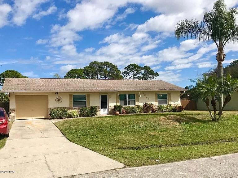 Amazing well maintained three bedroom two bathroom house for rent in Edgewater, Florida. This home offers many upgrades including renovated bathroom, windows and counter tops. One car garage parking, driveway and additional parking for your boat, trailer or water toys. Private screened back porch and partially fenced yard offers privacy. This home has solar panels so your ELECTRIC BILL INCLUDED IN THE RENT. Lawn service included. Tenant screening required for all adults. Pets negotiable with non refundable pet fee. Available to rent early September 2025 with 12 month lease miniumum. Please contact your real estate professional for viewing and application instructions. House comes unfurnished. Updated photos will be posted.