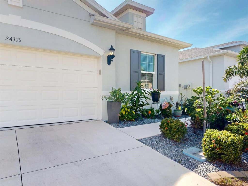 Photo of 24313 Westgate Boulevard, Port Charlotte, FL 33980 (MLS # C7529682)
