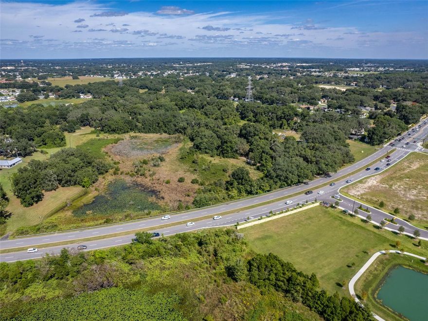 Offering is for a beautiful 11.6+/- Acres directly on CR 466 a major east - west arteri through the heart of The Villages with an additional adjoining 8+/- acres (D13-011) with hwy frontage also available separately. Excellent development opportunity with 23,500 FDOT Avg Trips per Day and $$ demographics that include The Villages as well as work force housing for this still growing hospitality, retail, professional, medical, commercial corridor. Easy access and great visibility. Value is in the land. Home on property will not be shown until due diligence. Property has well, septic and power provided by SECO electric. DO NOT ENTER without appointment. All information provided herein is believed to be accurate, but is not guaranteed nor represented or warranted.
