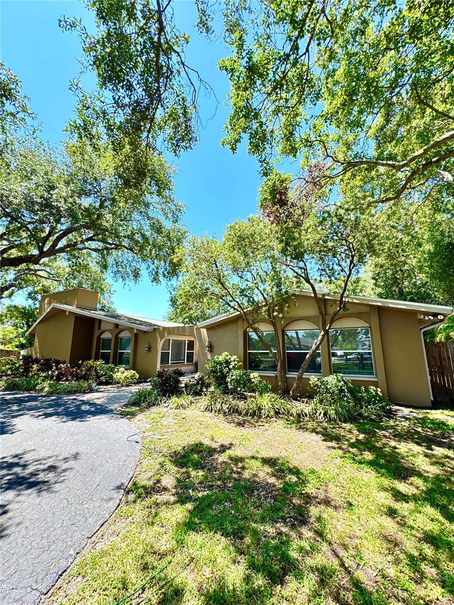 Exceptional Luxury Estate on ¾ Acre in Prestigious Belleair Road Location, just 15 minutes to Clearwater Beach and Belleair Beach, 10 minutes to downtown Clearwater, 25 minutes to downtown St. Petersburg, 30 minutes to downtown Tampa, and 25 minutes to Tampa International Airport. Close to all stores and restaurants, this very safe and highly desirable neighborhood offers no rental restrictions—perfect for investment or family living.
This home features two spacious master suites, a large in-law suite with private balcony and separate entrance, plus an open floor plan ideal for entertaining. The remodeled saltwater pool with screened enclosure creates a perfect outdoor retreat.
Enjoy a dedicated arcade/game room, 2-car garage, 3-car carport, and parking for jet skis or motorcycles. Modern smart features include Honeywell thermostats, smart locks, Arlo security cameras, and a smart garage system.
Additional highlights: New Roof (2020) • HVAC Updated with Smart Thermostats (2022) • Saltwater Pool with PebbleTech Finish & Heater (2021) • Pool Cage Rescreened (2025) • New gutters and front fence (2025) • New water heater (2021) • Strong Airbnb income history with over $285k in gross bookings for the last 3 years.
Previously owned by world champion boxer Keith Thurman Jr., this meticulously maintained estate blends luxury, smart technology, and investment potential in Tampa Bay’s most sought-after neighborhood.