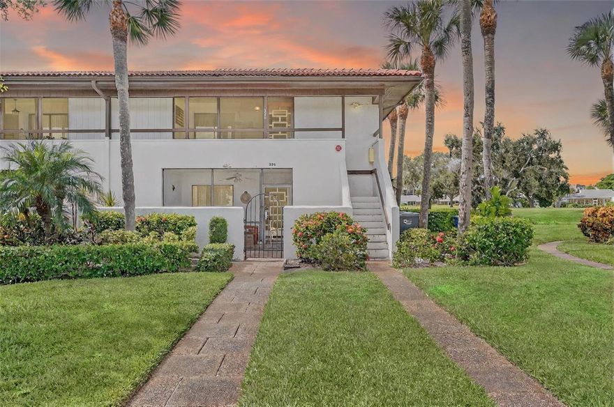 One or more photo(s) has been virtually staged. Lake & Golf Course Views | Corner Condo at IMG Country Club

Experience resort-style living at its finest in this beautifully updated corner-unit condo overlooking both the lake and lush fairways of IMG’s renowned golf course. Perfectly positioned on the top floor, this home offers enhanced privacy, peaceful breezes, and sweeping views that make every sunrise and sunset feel special.

Step inside and immediately notice the natural light streaming through the extra corner windows, highlighting the fresh, modern interior. The open layout showcases elegant mahogany plank flooring, contemporary cabinetry, and light gray tones carried through the quartz countertops, subway tile backsplash, and freshly painted walls. The kitchen is designed for both style and function, featuring stainless steel appliances, recessed lighting, and a smart flow for everyday living and entertaining.

The floor plan is thoughtfully designed with two primary suites, each offering private access to a full bath—ideal for hosting guests or enjoying a dual-owner setup. Both bathrooms have been tastefully updated with Travertine marble flooring and pedestal sinks, adding a touch of timeless sophistication.

Relax on your private screened lanai, where tranquil lake views and the gentle rustle of palm trees set the tone for morning coffee or evening wine. Just steps away, the community pool and hydrotherapy spa invite you to unwind after a day on the golf course, tennis courts, or exploring nearby beaches.

Located within the highly sought-after El Conquistador community, residents enjoy access to an exceptional lifestyle. The IMG Country Club—a semi-private club—offers championship golf, tennis through the IMG Academy, and a restaurant with panoramic views of Sarasota Bay. Miles of walking and biking paths weave through the area, and you’re just minutes from Anna Maria Island, Cortez Village, and some of the best seafood dining on Florida’s Gulf Coast.

Move-in ready and available for immediate occupancy, this maintenance-free condo delivers the perfect blend of style, comfort, and convenience—with no CDD fees and a location that truly captures the Florida lifestyle.

Live the resort life. Wake up to the view.