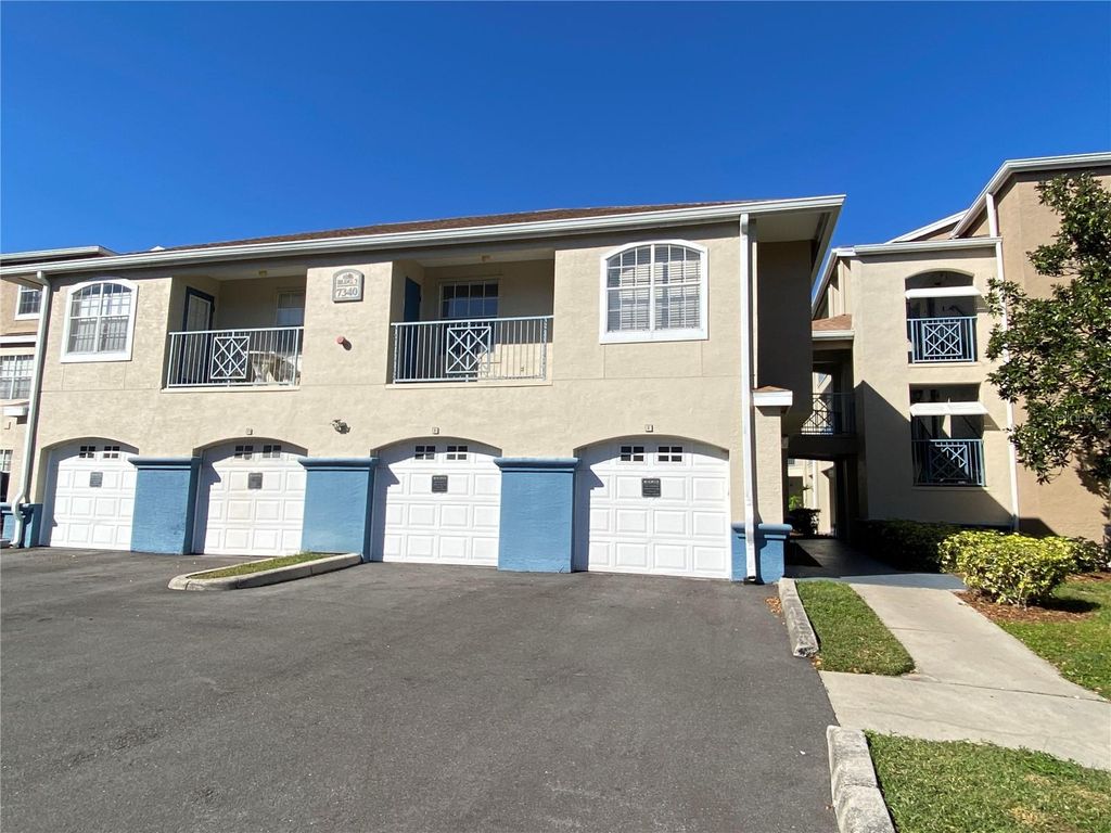 Photo of 7340 Westpointe Boulevard #329, Orlando, FL 32835 (MLS # O6369710)