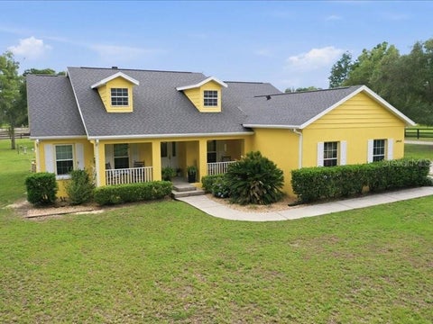 Photo of 19950 SW 5th Place, Dunnellon, FL 34431 (MLS # OM728818)
