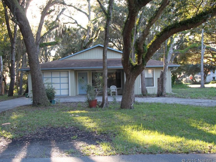 Nice 2 bedroom / 2 bath single family home on north end of Florida Shores. All tile floors throughout. Oversize corner lot sitting on 3 lots. Mature oak trees on property. Circular driveway. Functional wood shed with concrete floor, electrical outlet and light on back of property. Large concrete RV/Boat pad with 220 RV/Boat hook up for your toys! Lots of potential. This sale only includes lots 1695, 1696, 1697 facing Pine Tree in Florida Shores. Property is being resurveyed to reflect correct parcels that convey with this sale.ALL MEASUREMENT OF ROOMS ARE APPROXIMATE!! ;Water: City