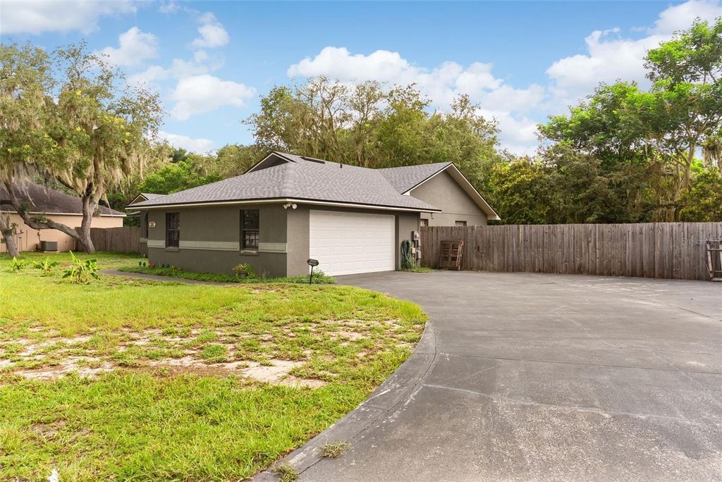 Photo of 1514 Lake Thomas Loop, Winter Haven, FL 33880 (MLS # TB8529479)