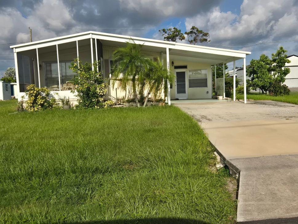 Holiday Mobile Estates (Manatee Cove) is a community that you may enjoy comradery with others or relax by yourself. The beaches of Manasota Key on the Gulf of America and only a few miles away. This lovely home has two bedrooms and two baths, two lanais and best of all it comes fully furnished down to the table ware. The homeowner's association is only $100. annually that offers clubhouse where they have many, many activities. You may have access to the boat ramp for a small fee and this water will lead out to Lemon Bay and the Gulf.