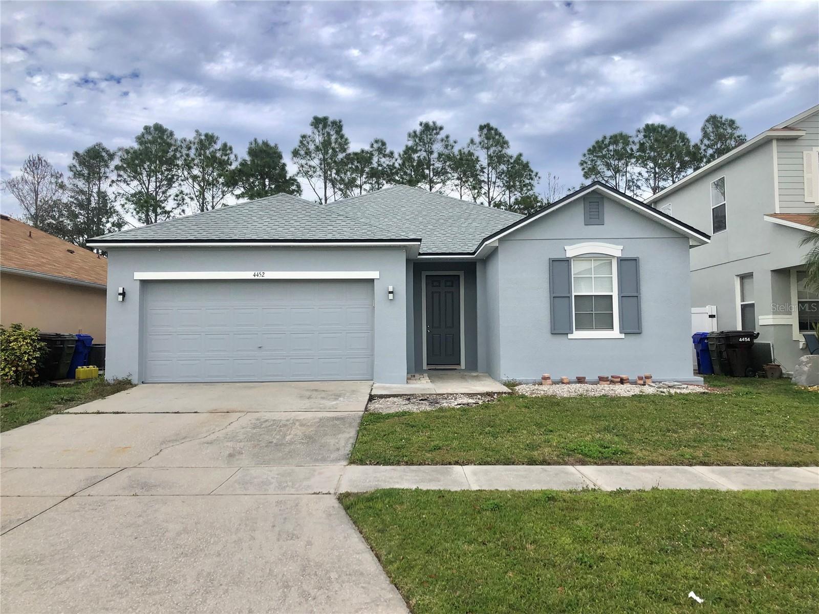 AVAILABLE NOW... COME AND ENJOY This charming 3 bedroom, 2 baths home nestled in the desirable Liberty Village of Kissimmee, offers a host of highlights that are sure to make this your perfect home. As you step inside, you'll be immediately greeted by HIGH CEILINGS and NEW VYNIL FLOORS throughout, adding a light and bright feeling to the space! RECENTLY FULLY RENOVATED with a New Roof, New floors, New kitchen, New Appliances, New Vanities. This home exudes a fresh and modern aesthetic, allowing you to move in and start enjoying it immediately. There is formal and family space, an EAT-IN KITCHEN and the perfect maintenance free backyard fully fenced. NO REAR NEIGHBORS. Conveniently situated, this home offers an excellent opportunity to live and enjoy its prime location, it is just a SHORT 15-MINUTE DRIVE to the world-famous DISNEY THEME PARKS and the surrounding attractions. You'll find an abundance of amenities, including restaurants, groceries, and the popular outlet mall, all within easy reach. Don't miss out on this perfect opportunity to rent a piece of Kissimmee's vibrant real estate market! Easy to Show, schedule your private showing today.