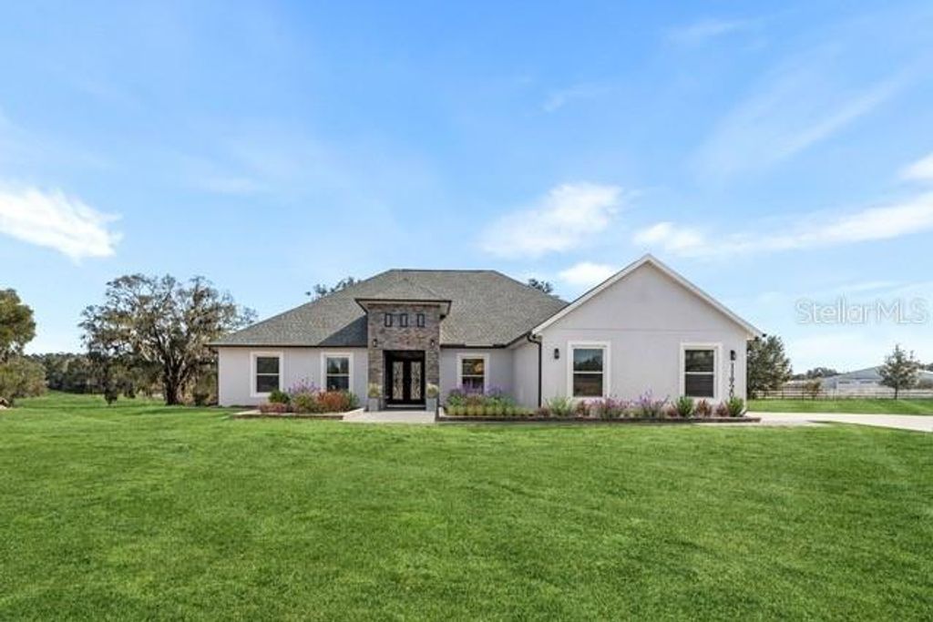 Photo of 11920 SE 8th Avenue, Ocala, FL 34480 (MLS # OM723894)