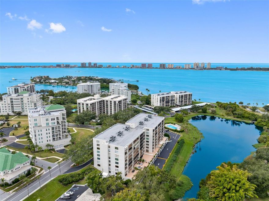 Here’s your chance to own a gorgeous, fully remodeled one-bedroom, one-bath condominium in the exclusive guard-gated Belleview Biltmore community. This fabulous condo has 915 square feet of living space and offers an oversized 450-square-foot terrace overlooking Harold’s Lake. Experience luxury with a low HOA fee. This is a must-see property, as everything has been done for you. Completely renovated with impact glass sliding doors, luxury vinyl plank flooring, smooth ceilings and walls, interior doors, hardware, ceiling tray crown and thoughtful integrated LED lighting throughout. The living and dining areas are huge at 25 by 15 feet with access to your private lake-front terrace with so much room to entertain. The custom kitchen is a chef’s delight with a breakfast bar, stone counters, a sparkling tiled backsplash, stainless appliances, a range hood and a wine rack. The bath has been completely remodeled with stone counters, a tiled backsplash and a fully tiled walk-in shower. The bedroom offers a large closet and impact glass sliding door to access your private terrace. The front foyer closet has decorative leaded glass door with abundant space. Convenient laundry closet with a washer and dryer. The condominium comes with one assigned carport parking space and one assigned storage closet under the building. Bayshore II is meticulously maintained with a secure lobby, video monitoring, a heated/cooled lakeside pool, a barbecue area, a clubroom and bike storage all on Harold’s Lake with a peaceful nature setting offering sights to behold, such as the Rosette Spoonbills. In the exclusive guard-gated Belleair Country Club, Belleview Biltmore, Belleview Inn communities. There is an optional private Belleair Country Club membership. A new owner of the unit qualifies for a discount on the initiation fee at BCC and also qualifies to skip the waiting list to apply for a golf membership. Wow, what a perk! Social memberships are also available should you choose. The private marina with boat slips for rent or purchase is subject to availability. In the Town of Belleair, it has its own police department, town hall, 19 green space parks, and a recreational center with activities for all. Close to Gulf beaches, excellent medical facilities, dining and shopping. Two international airports, PIE is 20 minutes and TPA is 30 minutes. If you are looking for efficient luxury living in a gorgeous community with a low HOA fee, this is it! There is a floor plan photo slide. No pets allowed. Must own two years before renting.