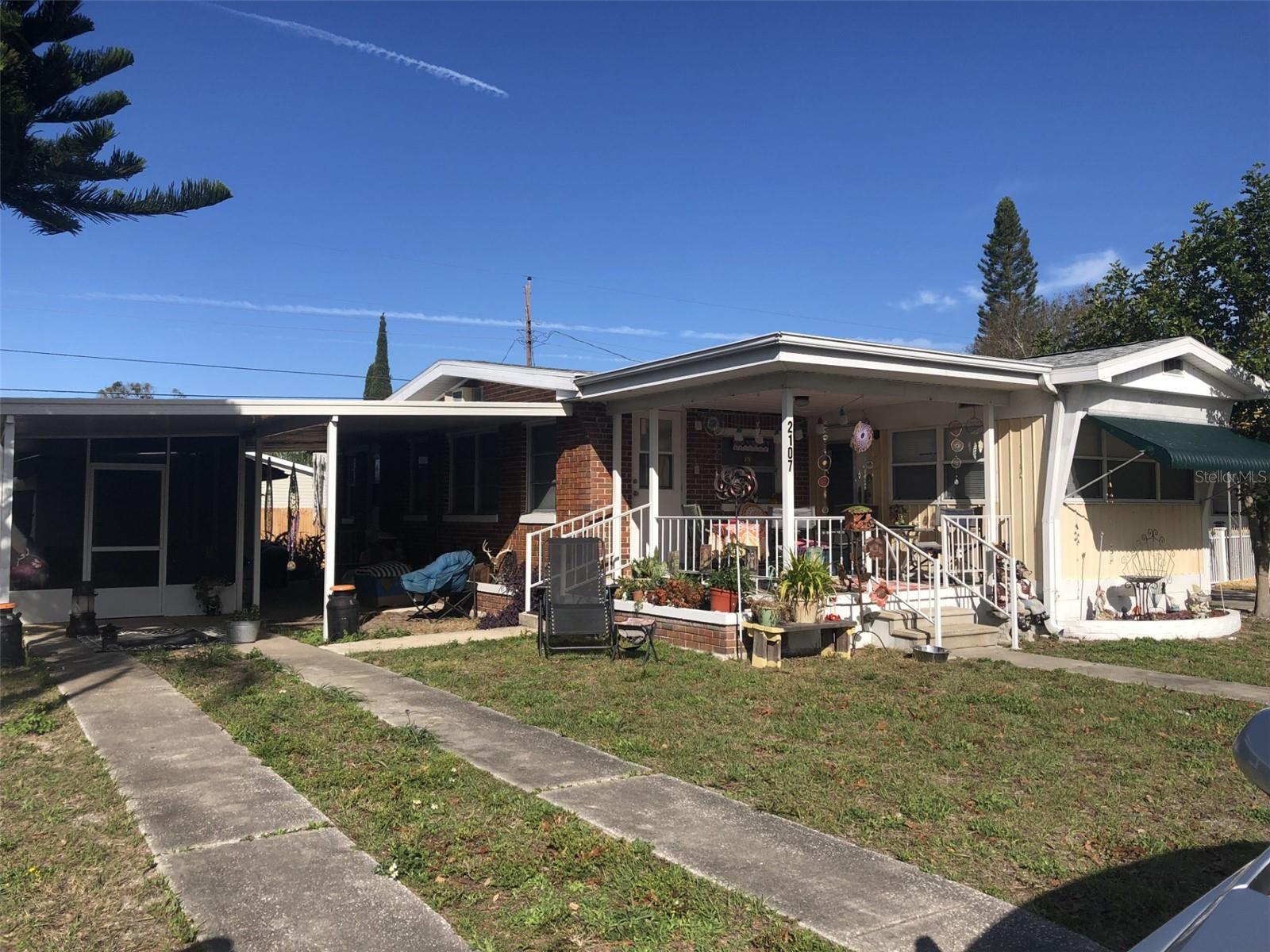 Offered as part of a divisible, four-property portfolio. Preference will be given to prospective purchasers that submit offers on all four properties. Please reach out to the listing agent for financial information on the portfolio. DO NOT SPEAK WITH ANY OF THE TENANTS OR ACCESS THE PROPERTY WITHOUT PRIOR CONSENT OF THE LISTING AGENT.
2 Bedroom, 2 1/2 Bathroom, well maintained mobile home with large concrete block addition. Oversized carport with a screen enclosure where you can be outside all times of the day. Large open family room with cathedral ceiling 12' X 22'. Concrete block shed with a plenty of built in storage as well as washer, dryer, shower and sink. The home has central heat and air. The property is owned fee simple, with no lot fees other than a quarterly association assessment. Two community clubhouses with affordable HOA,($109.50/quarterly) trash removal and use of the clubhouse included. NOT IN A FLOOD ZONE. Convenient proximity to beaches, shopping, easy commute to Clearwater and Tampa. Tenant in place for immediate income to potential investors.