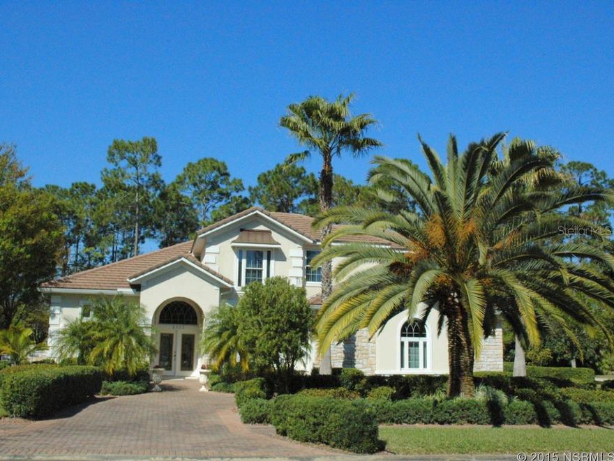 Under contract taking backups. Elegant home with motor coach garage located on corner lot in prestigious Four Seasons at Spruce Creek Fly-In, a gated country club community with 24/7 roving security. This 2-story, 3 bedroom, 3 Â½ bath home with loft/office & attached 35X48 RV garage shows meticulous detail to quality. The excellent floor plan offers thermopane windows, volume ceilings, crown molding & wainscoting. The Great Room opens through French doors to the screened lanai & pool with fountain. The pool bath also serves the RV garage. This pristine kitchen has a center island, walk-in pantry, plenty of counter space & cabinets. First floor Master Suite has a jetted tub, shower, two vanities & walk-in closet. The second level consists of two bedrooms, one full bath plus loft area with built-ins for your computer. The tiled 35X48 RV garage is wide enough for your coach, trailer & golf cart. There is an enclosed clean-up area with a sink. Storage area in the RV garage is easily accessible. Four mercury-vapor lights overhead offer plenty of lighting to showcase your coach or work area with separate 220 voltage. Other features in the home include irrigation system with deep well, 2 HVAC units plus attic space in your oversized tiled garage. Spruce Creek Fly-In offers 24/7 security, parks & private airport with 4000' paved runway with GPS approach, championship golf, tennis, fitness center & restaurants. (FURNISHINGS AVAILABLE AT ADDITIONAL PRICE). ;Water: City