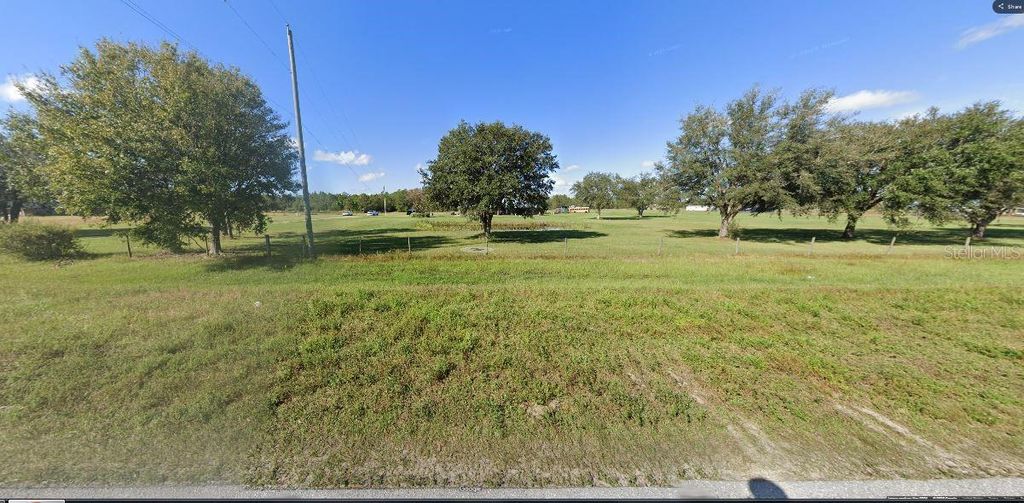 Photo of Old Grade Rd, Polk City, FL 33868 (MLS # O6265128)