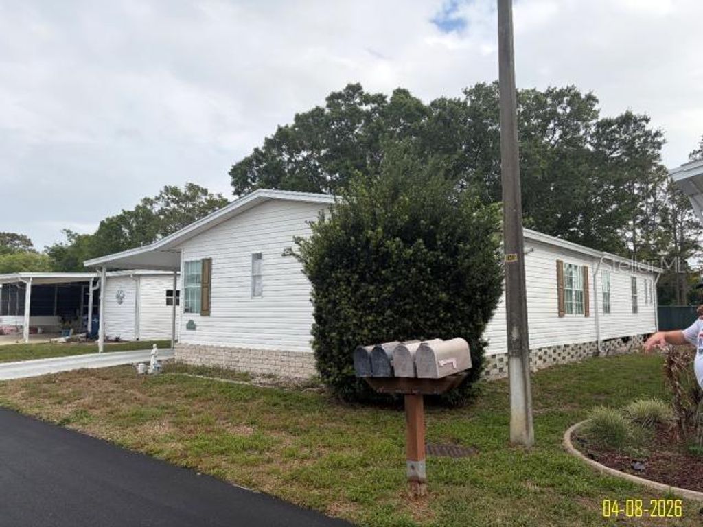 Photo of 8034 Monitor Dr, New Port Richey, FL 34653 (MLS # V4948576)