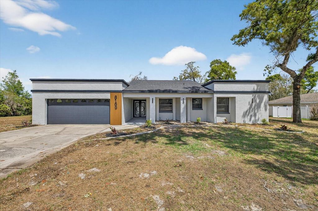 Photo of 8169 Berkeley Manor Boulevard, Spring Hill, FL 34606 (MLS # TB8494697)