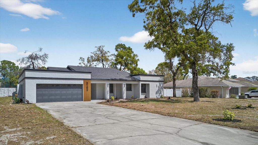 Photo of 8169 Berkeley Manor Boulevard, Spring Hill, FL 34606 (MLS # TB8494697)