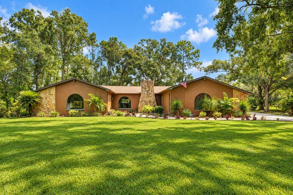 Photo of 6916 Copperfield Drive, New Port Richey, FL 34655 (MLS # W7890108)