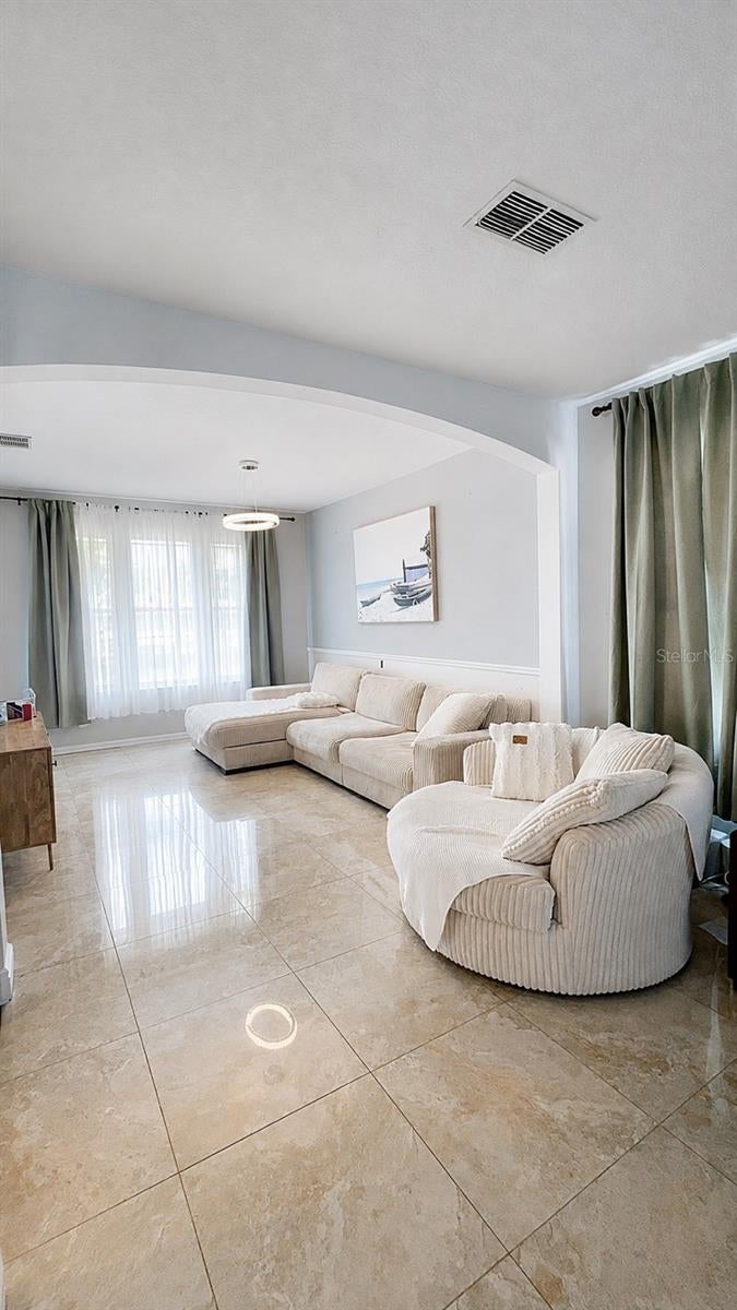 Photo of 2409 Sand Arbor Circle, Orlando, FL 32824 (MLS # O6439289)