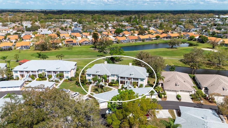 This tastefully updated second-floor 2BR/2BA condo offers sweeping golf course views and an inviting country-club lifestyle. The open living and dining area features vaulted ceilings and flows to a screened balcony enclosed with sliding vinyl panels, creating additional year-round living space while enjoying peaceful fairway views. The kitchen has been updated by the current owner with new cabinetry, quartz countertops, newer appliances, a convenient breakfast bar, and a charming bistro dining area. Luxury vinyl plank flooring runs throughout the great room and both bedrooms for a clean, modern look and easy maintenance. The primary suite also overlooks the golf course and features a bath with a newer vanity and a beautifully updated walk-in shower. The guest bath includes a tub/shower combination. Additional features include a new A/C system installed in 2025 and a 2024 washer & dryer. The detached one-car garage with a private owner’s closet provides valuable extra storage space. For a quick dip, there is a community pool located just steps from the condo. Residents also have a full membership to Peridia Golf & Country Club, featuring an 18-hole golf course, tennis, pickleball, an active social calendar, the popular Terrace on the Green restaurant, and casual poolside dining at the Tiki Bar. Conveniently located just a short drive to shopping, Gulf beaches, downtown Sarasota, I-75, and 50 miles from Tampa. Furnishings negotiable.